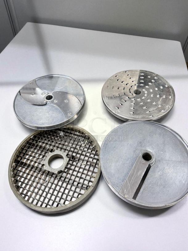 Robot Coupe CL50 Ultra blades set, heavy-duty and clean, ready for commercial use. Includes slicing and grating discs.