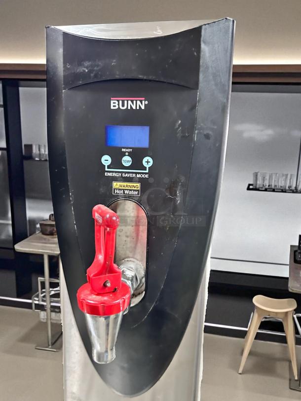 BUNN H5E 120V digital hot water dispenser in excellent condition, red tap, tested and working, energy saver mode visible.