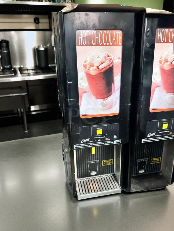 Curtis PC-1D-10 hot chocolate dispenser, excellent condition, tested & working. Features labeling for easy operation, 120V.