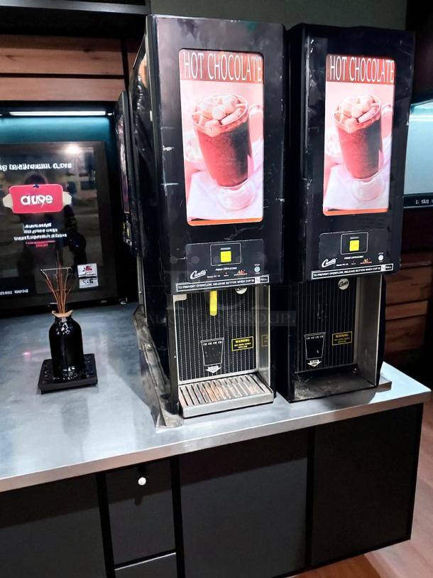 Curtis PC-1D-10 Hot Chocolate Dispenser, excellent condition, 120V, fully tested, dual dispensers, clear branding, operational.