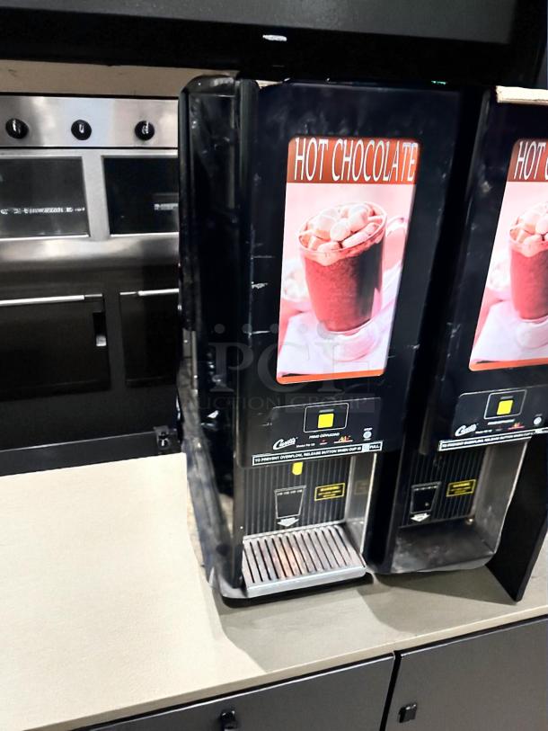 Curtis PC-1D-10 hot chocolate dispenser in excellent condition, 120V, tested and working, with branding and control panel visible.