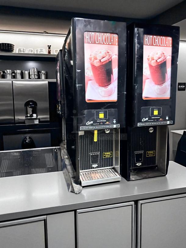 Curtis PC-1D-10 hot chocolate/cappuccino dispenser, excellent condition, 120V, fully tested and working, black exterior.