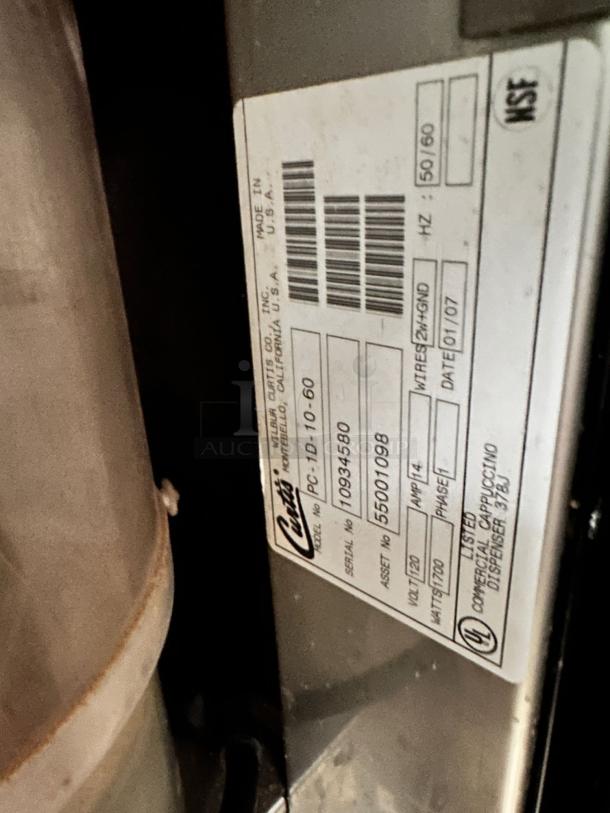 Curtis PC-1D-10 Hot Chocolate/Cappuccino Dispenser, excellent condition, model/serial tags visible, 120V, NSF certified.
