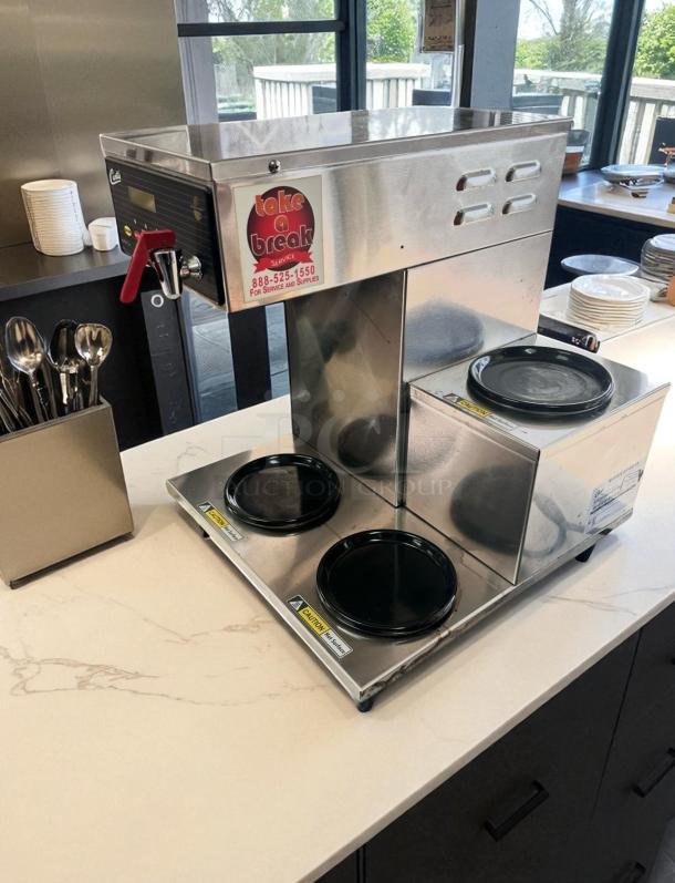 Curtis ALP3GTR12A000 3-burner automatic coffee brewer, stainless steel, 120V, excellent condition, fully tested and working.