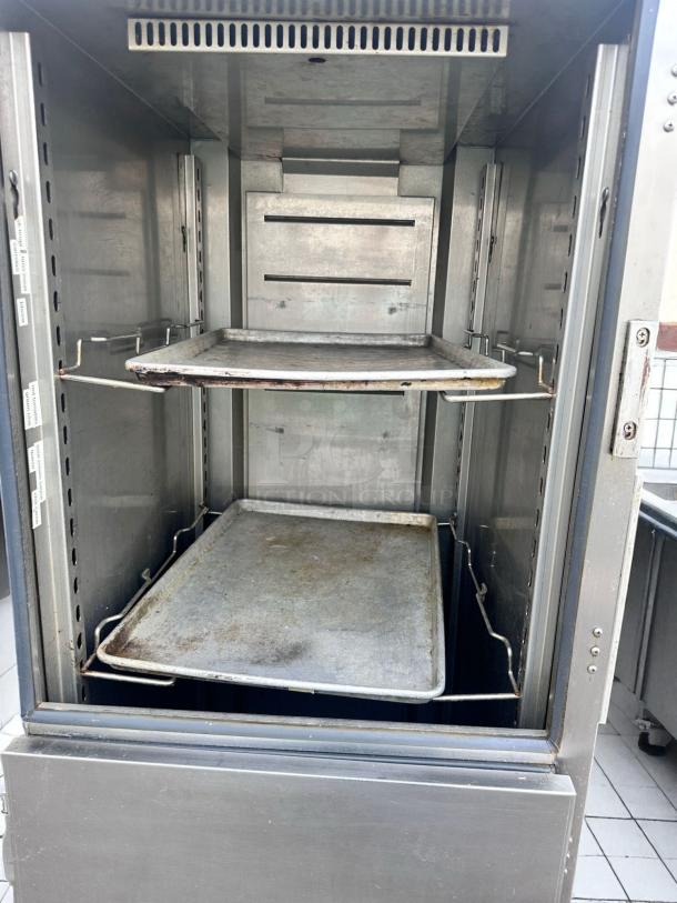 FWE UHST-13-OTB heated holding cabinet in outstanding condition, 120V, with adjustable racks, fully tested and working.