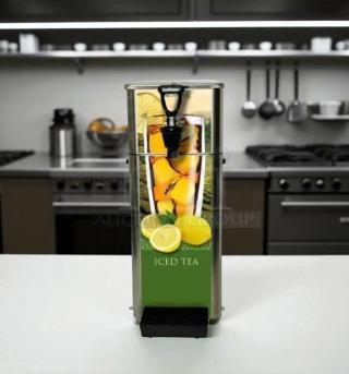 Newco FPM-1 countertop lemonade dispenser, excellent condition, NSF listed, fully tested, with vibrant lemon graphics.