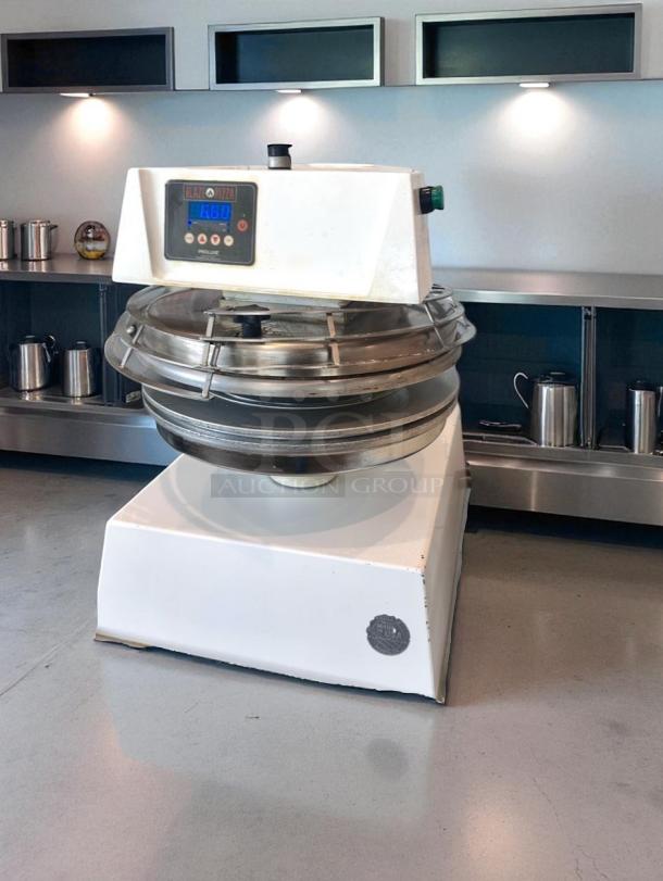 Proluxe PRS220 pizza dough divider, excellent condition, electric, fully tested and working, in a commercial kitchen.