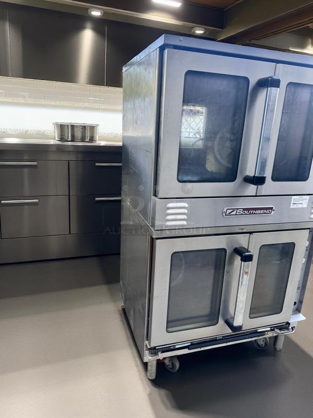 Southbend KLG.S/27SC double-stack natural gas convection ovens in excellent condition, stainless steel, fully tested, on casters.