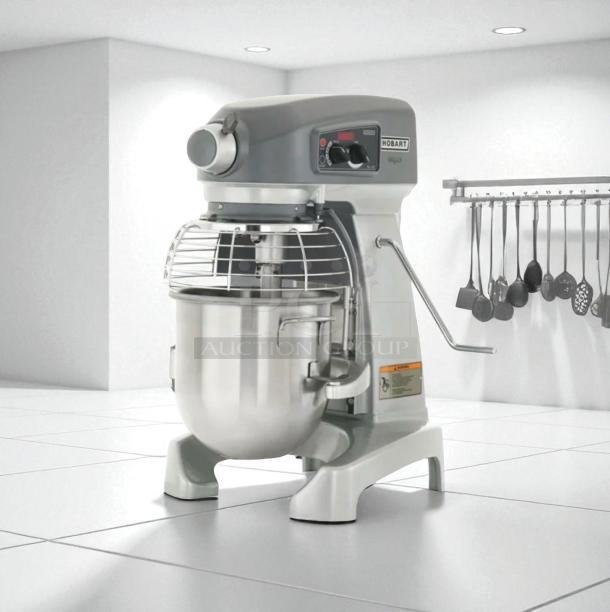Hobart HL200 20 Qt Planetary Mixer, 1/2 HP, excellent condition, 120V, fully tested, with control knobs and safety guard.