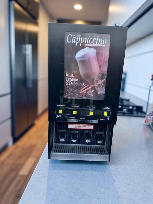 Wilbur Curtis PC-4D-10-01 cappuccino machine, 4-flavor, excellent condition, 120V, fully tested, visible flavor selection buttons.