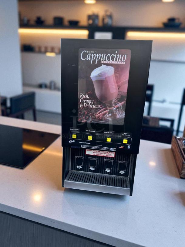 Wilbur Curtis PC-4D-10-01 4-flavor cappuccino machine in excellent condition, on countertop. Fully tested, 120V.