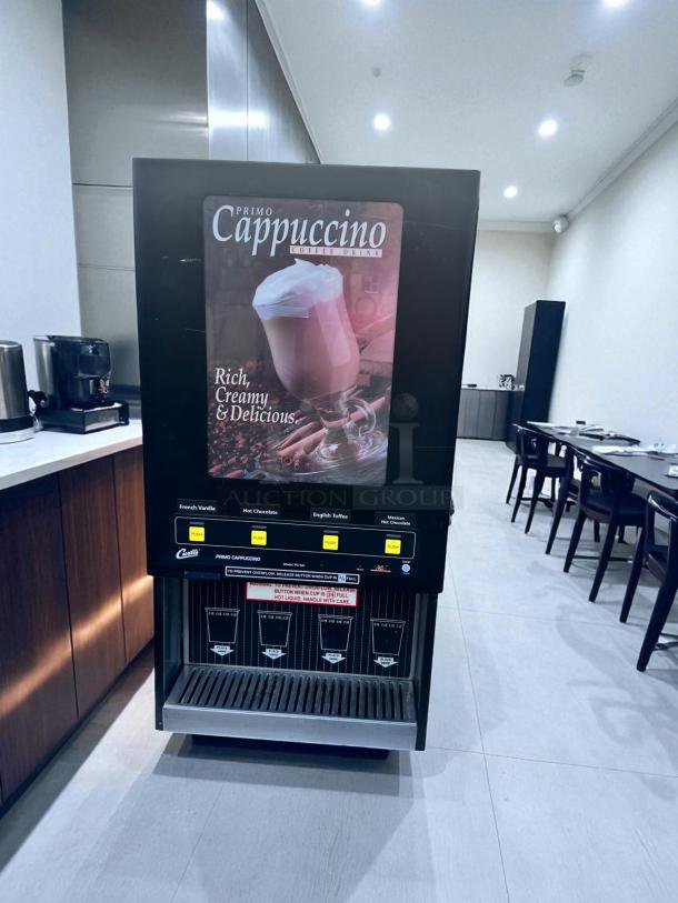 Wilbur Curtis 4-flavor cappuccino machine, model PC-4D-10-01, excellent condition, fully tested, 120V, front panel labeled.