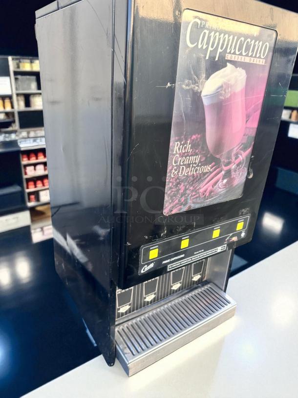 Curtis PC-4D-10-01 4-flavor cappuccino dispenser, excellent condition, 120V, tested and working, with cappuccino label.
