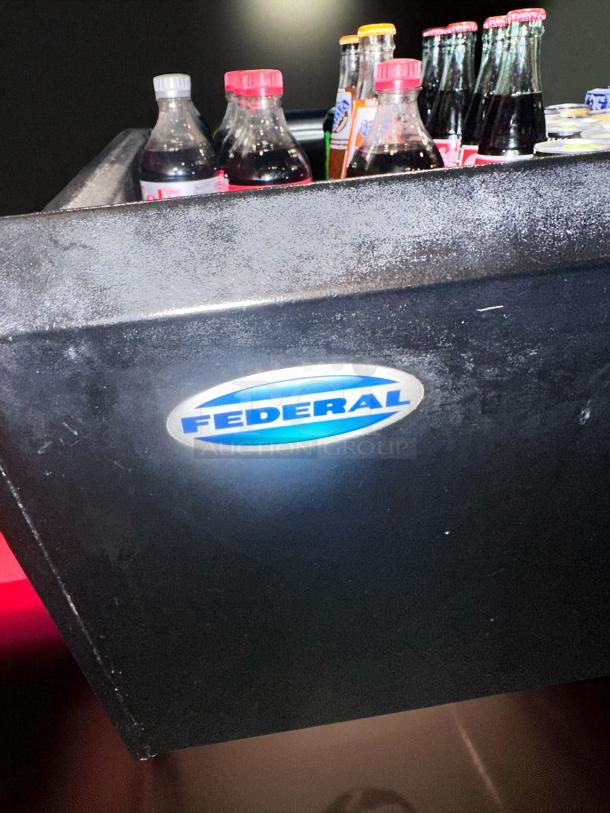 Federal black open-air refrigerated merchandiser, excellent condition, fully tested. Features brand logo, displays beverages.
