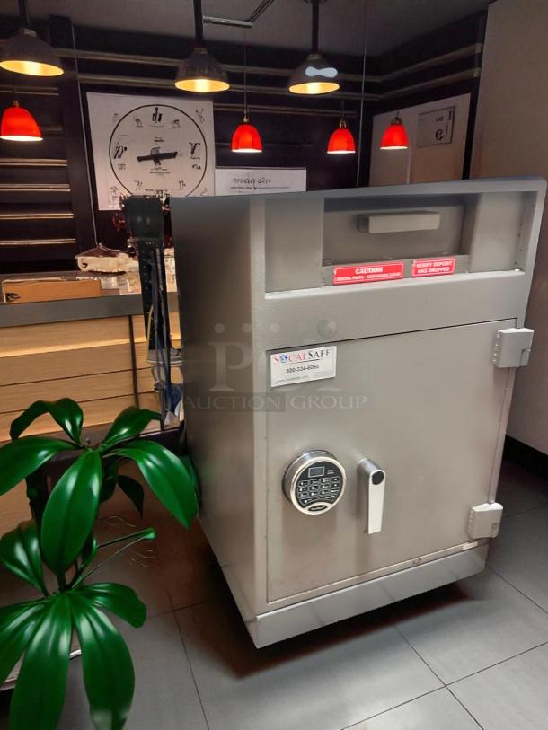 SoCal Safe deposit safe, excellent condition, digital keypad entry, drop-slot, tested, model plaque visible, secure storage.