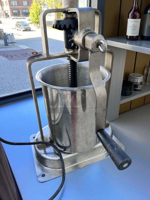 Kabab-O-Matic Manual Vertical Press, excellent condition, stainless steel, fully tested, includes handle and visible BID tag.