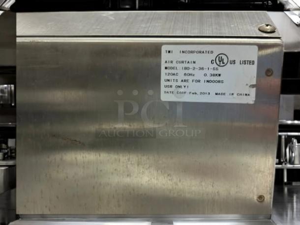 Curtron AP-2-36-1-SS 36" air curtain, stainless steel, 120v, fully tested, 2-speed, label shows model and indoor use info.