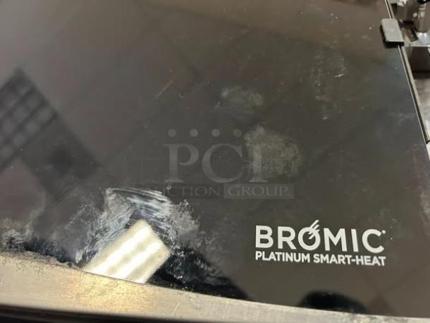 Bromic Heating BH011-500 Platinum Smart-Heat 500 Series gas patio heater in excellent condition, label visible.