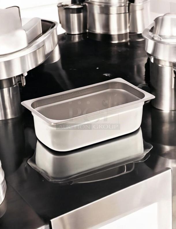 Brand new Browne Foodservice anti-jam steam pan, 1/3” size, 4” deep, model 22134. Stainless steel, pristine condition.