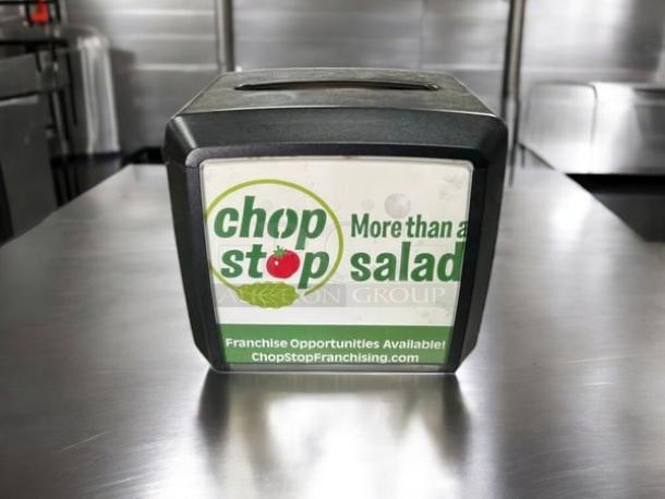Black Dixie Ultra napkin dispenser by GP PRO, model 54527A, in excellent condition. Holds 275 napkins. Front label reads "Chop Stop."