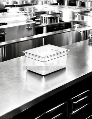 Cambro 26CW135 Camwear 1/2 Size 6in Deep Polycarbonate Food Pan in great condition on a stainless steel surface.