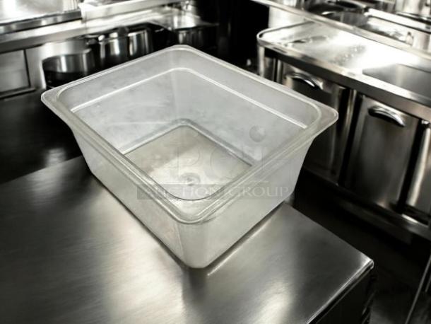 Cambro 26CW135 Camwear 1/2 Size 6in Deep Polycarbonate Food Pan in great condition on a stainless steel surface.