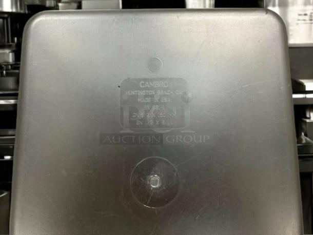 Cambro 26CW135 Camwear polycarbonate food pan, 1/2 size, 6in deep. Label shows "Cambro, Made in USA, 26CW135." Great condition.