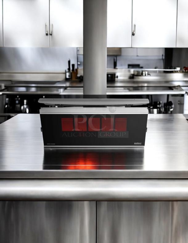 Bromic Heating BH011-500 Platinum Smart-Heat gas patio heater in excellent condition on a stainless steel surface.