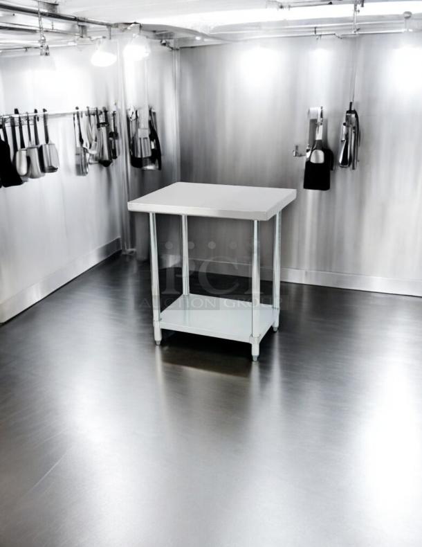 Stainless steel worktop table, 30"x30"x34", excellent condition, fully tested and working, ideal for kitchens or workshops.