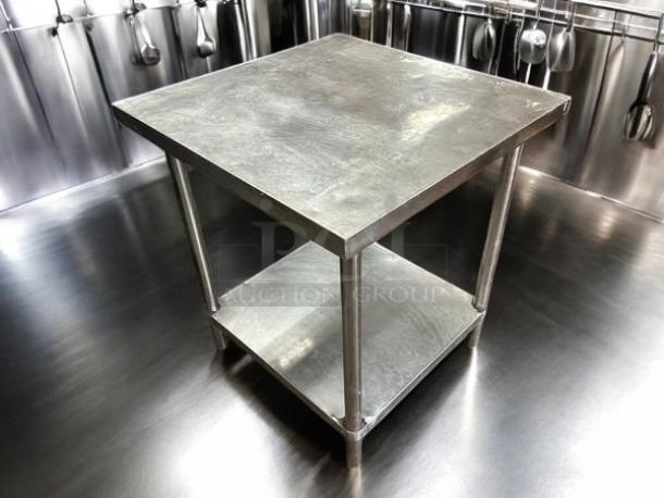 All stainless steel worktop table, 30"Wx30"Dx34"H, excellent condition, fully tested and working, features lower shelf.