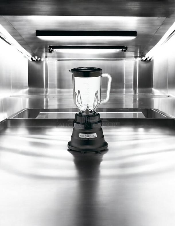 Waring Commercial BB150 blender, 48 oz, two-speed, great condition, fully tested, black base, clear jar, lid included.