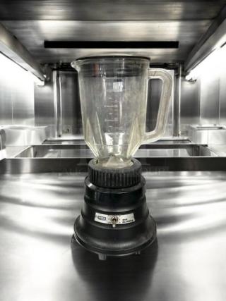 Waring Commercial BB150 blender, 48 oz, two-speed, in great condition, fully tested, clear jar with handle on black base.