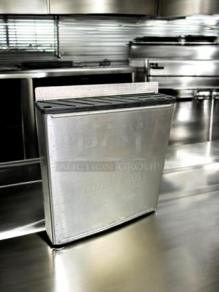 Cozzini Bros stainless steel knife rack, model #KS-SSKNR12, in excellent condition, 12-inch size, fully tested and functional.