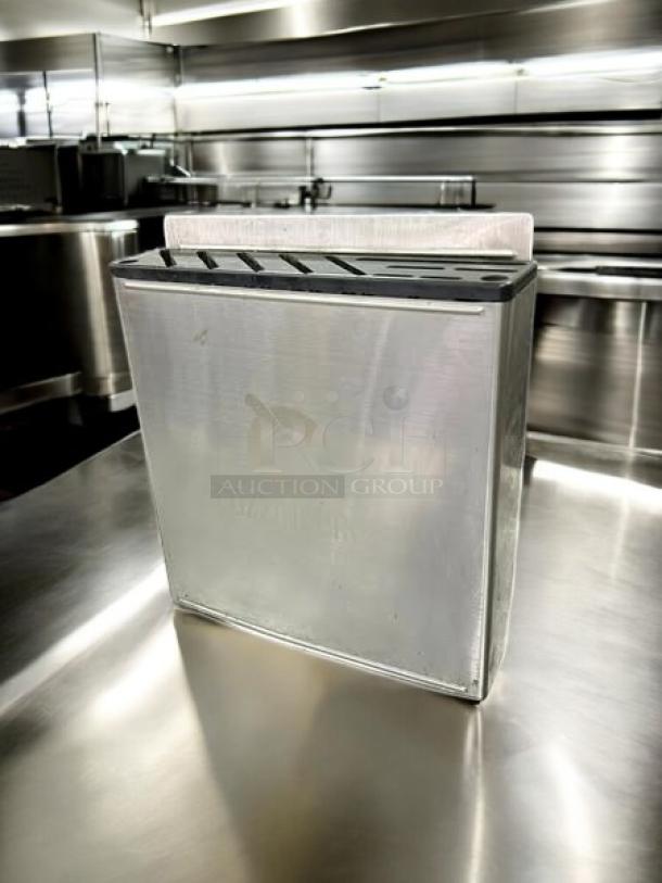 Cozzini Bros 12" stainless knife rack, model #KS-SSKNR12, excellent condition, fully tested, sleek design.