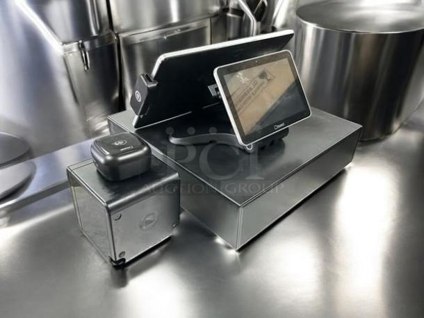 Toast register kit with money box on stainless steel table. Complete, tested, working. Includes touchscreen, sleek design.