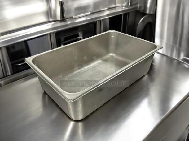 Stainless steel hotel pan in excellent condition on a metal surface; fully tested and working. Various sizes available.