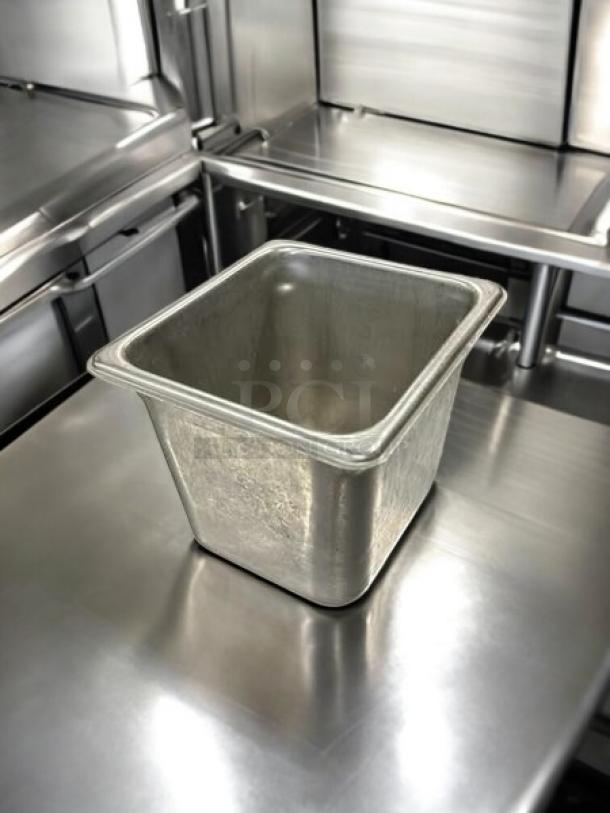Stainless steel hotel pan in excellent condition, tested and working, on a metal countertop. Various sizes available.