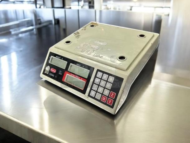 Avery Berkel CZ342 price computing food scale, excellent condition, tested and working, visible keypad and display.