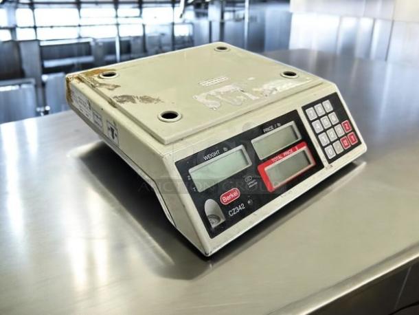 Avery Berkel CZ342 price computing food scale in excellent condition on countertop, fully tested and working, shows digital display and keypad.