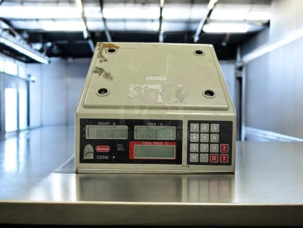 Avery Berkel CZ342 price computing food scale in excellent condition on countertop; displays, buttons visible.