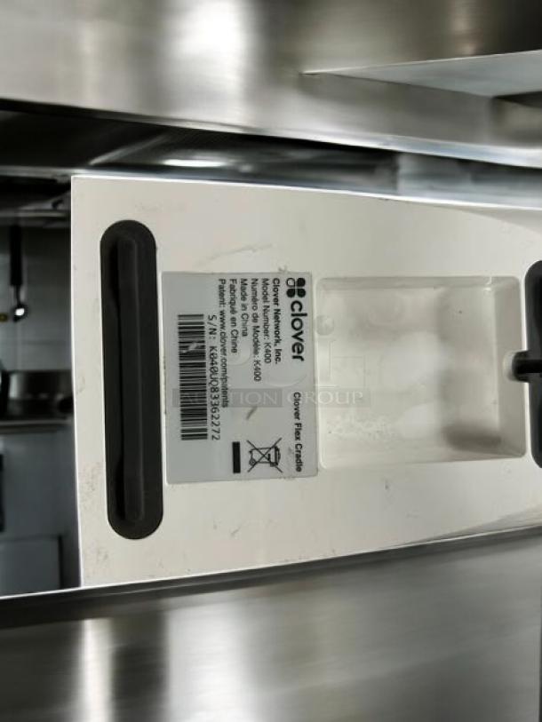 Clover Flex handheld POS system in excellent condition, fully tested and working. Label shows model and serial number.