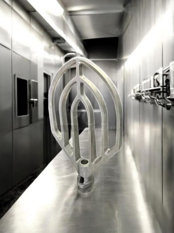 Planetary 20Qt dough paddle FMP 205-1043, in great condition, fully tested and working, displayed on a metal surface.