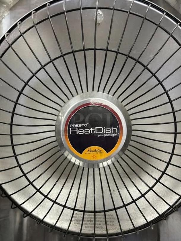 Presto HeatDish parabolic electric heater, 115V, fully tested, excellent condition. Center label indicates model and function.