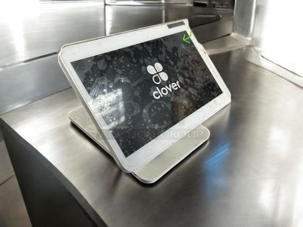 Clover Model C500 POS Station in excellent condition, fully tested and working, sleek screen on a sturdy base.