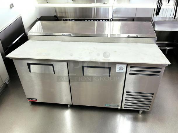 True TPP-AT-67-HC 67" Pizza Prep Table, stainless steel, refrigerated base, tested, working, visible brand label.