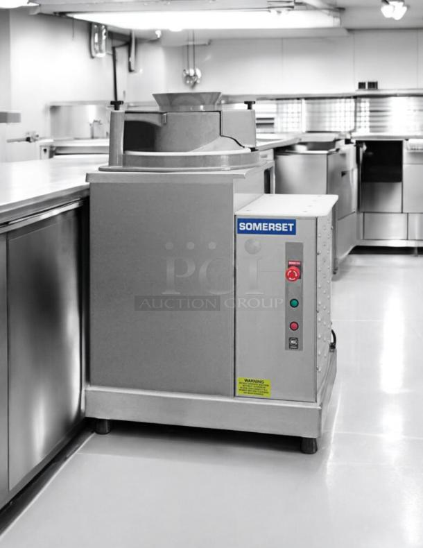 Somerset SDR-400T dough rounder in amazing condition, 1-36 oz. capacity, 120V, 3/4 HP, tested and working, with control panel.