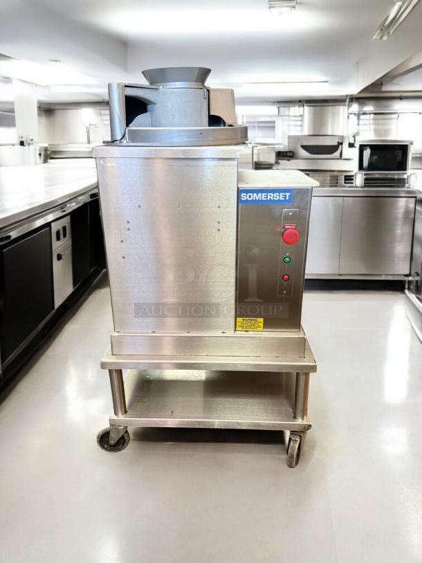 Somerset SDR-400T dough rounder, 120V, 3/4 HP in excellent condition. Metal finish, working, visible control panel, and labels.