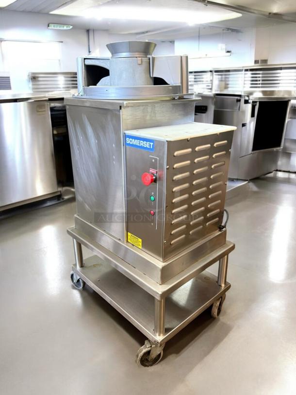 Somerset SDR-400T dough rounder in excellent condition, 120V, 3/4 HP, on caster wheels, tested and working.