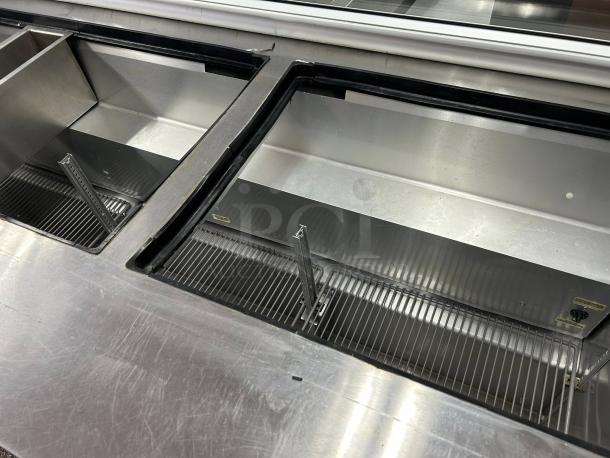 True Model TSSU-72-30M-B-ST-FGLID-HC sandwich prep cooler, three sections, stainless steel, glass lid, excellent condition.