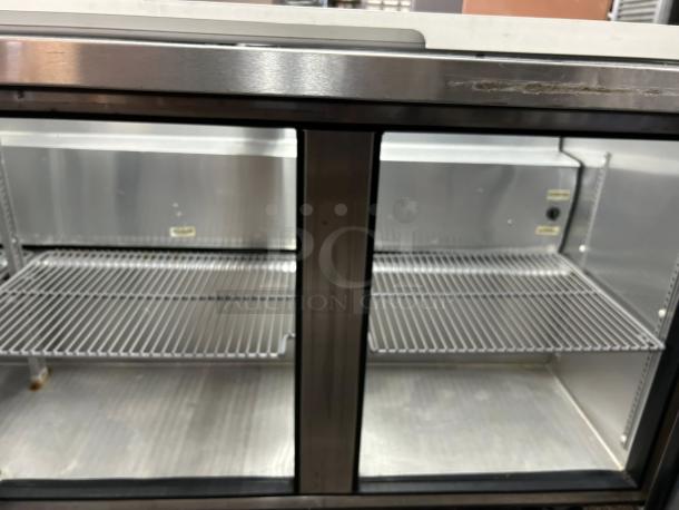 True Model TSSU-72-30M-B-ST-FGLID-HC prep cooler, three sections, glass lid, tested and working, excellent condition.